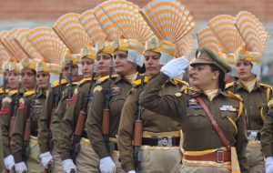 Security personnel march past during the celebration of Republic Day in Jammu