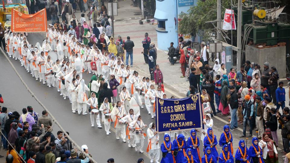 Sikh devotees participate in a Nagar Kirtan on Prakash Parva