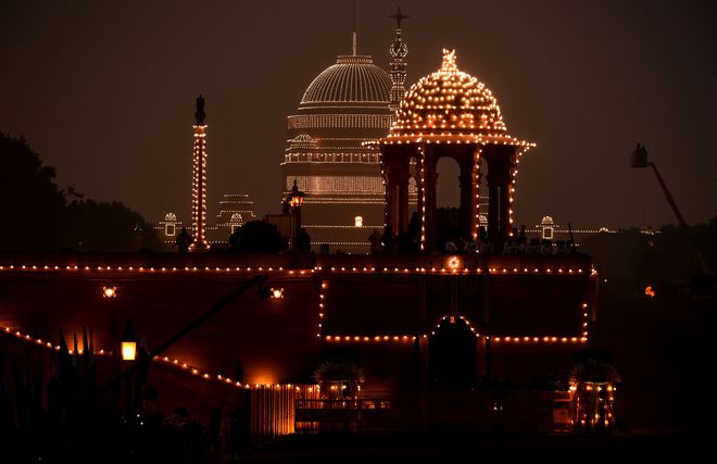 The Presidential Palace buildings are illuminated during the Beating Retreat ceremony at Vijay Chowk in New Delhi on January 29, 2017