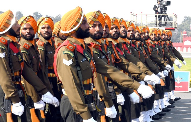 The Territorial Army’s Sikh Regiment marches during the 69th Army Day parade in New Delhi