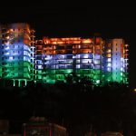 Under-construction buildings lit up in the colours of the Indian flag on the eve of Republic Day in Bangalore