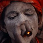 A Hindu holy man, or sadhu, smokes marijuana at the premises of Pashupatinath Temple during the Shivaratri festival in Kathmandu, Nepal February 24, 2017