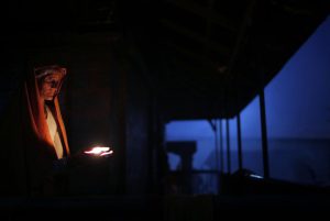 A Hindu holy woman lights an oil lamp during Shivaratri festival in Kathmandu, Nepal, Friday, Feb. 24, 2017. Shivaratri, or the night of Shiva, is dedicated to the worship of Lord Shiva, the Hindu god of death and destruction