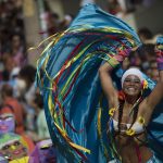 A reveler performs during the Carmelitas street party in Rio de Janeiro, Brazil.