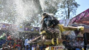 Artist dressed as Lord Shiva in sector 15 Market, Chandigarh, on the occasion of Maha Shivratri