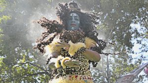 Artist dressed as Lord Shiva in sector 15 Market, Chandigarh, on the occasion of Maha Shivratri