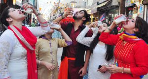 Devotees drinking ‘Bhang’ during the Shobha Yatra being taken out in the main bazar on the occasion of Shivratri celebration in Patiala