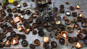 Incense sticks and diyas after morning prayers at the temple