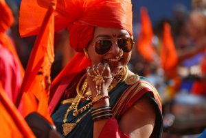 A woman dressed in traditional costume attends celebrations to mark the Gudi Padwa festival, the beginning of the New Year for Maharashtrians, in Mumbai on March 28, 2017