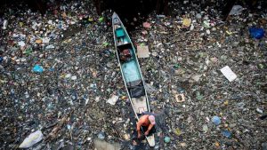 A worker collects garbage from the Marilao River in Bulacan, north of Manila. Pure Earth, formerly known as the Blacksmith Institute, a non-governmental organisation that works to solve pollution problems in the developing world, named Marilao River as one of the 30 dirtiest places in the world in 2007