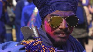 A young Nihang after playing with Holi colours