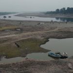 Boats are seen parked alongside a patch of river on the outskirts of Lahore, ahead of World Water Day. International World Water Day is marked annually on March 22 to focus global attention on the importance of water