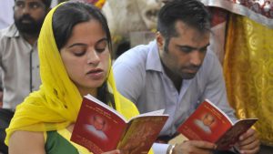 Devotees praying on the occasion of Navratri festival at Durga Mata temple in Ludhiana