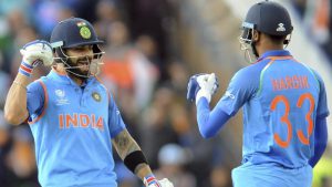 Hardik Pandya (R) hit three sixes in a row in the final over as India posted a formidable total of 319/3 in 48 overs.