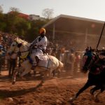 Nihangs ride their horses displaying tent pegging and other horse riding. The Hola Mohalla celebrations made its beginning around 1701 as Guru Gobind Singh wanted his troops to have mock battles to keep them battle-ready