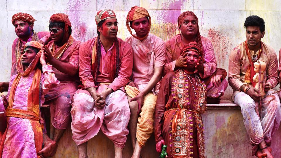 People of Nandgaon rest after participating in the celebrations