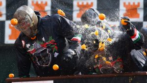 The Battle of the Oranges is a festival in the Northern Italian city of Ivrea, which includes a tradition of throwing of oranges between organized groups