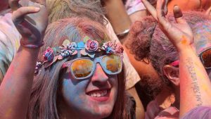 Thousands of revelers during the Holi festival at Santa Coloma de Gramene, where they tossed handfuls of colored powder at one another and danced to the rhythms made popular by India’s Bollywood films.