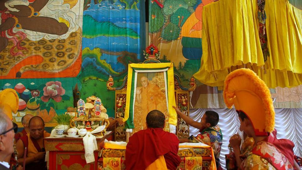 Tibetan monks arrange the portrait of exiled Tibetan spiritual leader, the Dalai Lama, during a function organised to mark ‘Losar’, or the Tibetan New Year, in Kathmandu. Losar festival, which has its origin in the 15th century, celebrates the Ladakhi or Tibetan New Year. It is said to last 15 days, but the first 3 days are the most important ones.