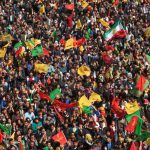 Turkish Kurds gather to celebrate Newroz at Diyarbakir. In a sign of the tensions, police opened fire on a man carrying a knife and a rucksack who did not obey a request to have his bag searched as he entered the designated area and shouted he was carrying a bomb