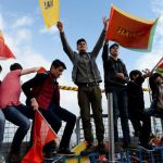 Turkish Kurds wave flags with the lettering 'No' in Turkish and Kurdish. We will continue with our struggle for peace, never giving up our quest for freedom through democratic politics, the jailed co-chairs Selahattin Demirtas and Figen Yuksekdag said in a statement issued by the HDP