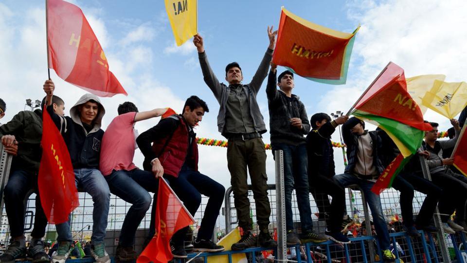 Turkish Kurds wave flags with the lettering 'No' in Turkish and Kurdish. We will continue with our struggle for peace, never giving up our quest for freedom through democratic politics, the jailed co-chairs Selahattin Demirtas and Figen Yuksekdag said in a statement issued by the HDP