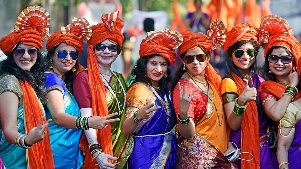 Women fuse traditional with quirky glares as they pose for a photograph in Mulund