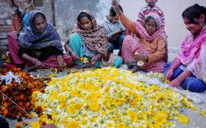 Women make garlands in Amritsar on International Women’s Day on March 8, 2017