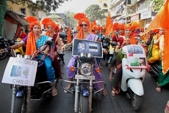 Women participate in a community parade (Shobha Yatra) to mark the Gudi Padwa festival, the beginning of the Maharashtrian New Year, in Mumbai on March 28, 2017
