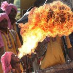 A fire-eater from Punjab performs to the heady beat of the traditional dhol. Participants from various states danced, sang and performed as they walked the 5km long rally