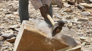 A majority of mines operate using dry mining that generates a large amount of residual dust. This is compounded by a lack of protective gear for miners exposing them to inhalation of fine silica particles. A shift towards wet mining which reduces the amount of dust is a relatively cost efficient means of curbing the hazard of silicosis --so far a disease with no known cure.