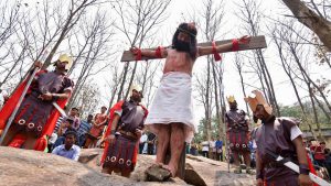 A man portrays Jesus Christ during a re-enactment to mark Good Friday in Guwahati