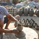 A potter making water pots in Mansoorwal village on the outskirts of Kapurthala