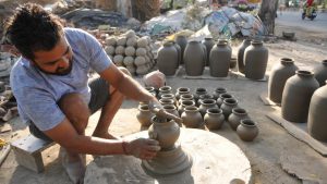 A potter making water pots in Mansoorwal village on the outskirts of Kapurthala