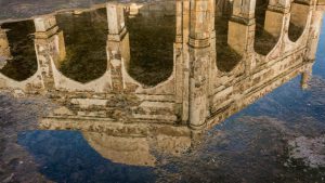 Adham Khan’s tomb was built along the ramparts of the 12th century Qila Rai Pithora or Lal Kot, following his execution for the murder of Ataga Khan, one of Akbar’s generals in 1562. The emperor had Adham Khan thrown off the walls of the Agra Fort twice for this betrayal. The mausoleum also contained the tomb of his mother Maham Anga (Akbar’s wet nurse) who died soon after in despair.