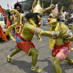 Artists dressed as characters of Ramayana performing during a road show on the occasion of the 9th day of Navratri at Hanuman Temple near Kempegowda Railway Station in Bengaluru on Wednesday, April 5, 2017. Ram Navami is being celebrated on two days this year as many people celebrate the occasion according to when the lunar calendar shifts into the ninth day, or when the sun rises on the ninth day depending on their interpretation