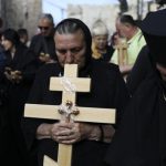 Christian pilgrims attend Good Friday procession in Jerusalem. Good Friday is a Christian holiday which marks the crucifixion of Jesus Christ and his death