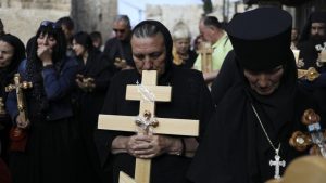 Christian pilgrims attend Good Friday procession in Jerusalem. Good Friday is a Christian holiday which marks the crucifixion of Jesus Christ and his death