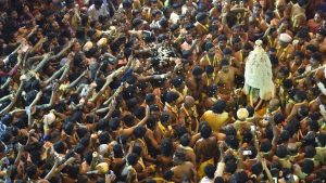 Crowds chanting as Karaga comes out from the temple on the occasion of Karaga at Dharmaraya Swamy Temple in Bengaluru