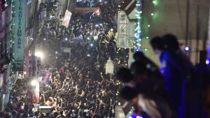 Devotees gathered along the lane as Karaga moves on the occasion of Karaga at Dharmaraya Swamy Temple in Bengaluru, India, on Wednesday, April 12, 2017. This is over 800 yrs old festival of worshiping adishakti Draupadi. Every year, the Thigalas celebrate a festival called Karaga. The story of the Karaga is also rooted in the Mahabharata.Draupadi is the community deity of the Vahnikula Kshytriyas. The Karaga is an annual celebration of her as the ideal woman and of woman-power (Mother Goddess)