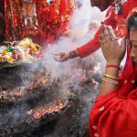 Devotees pray at the historical Goddess Kali temple on the last day of Navratri festival