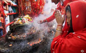Devotees pray at the historical Goddess Kali temple on the last day of Navratri festival