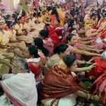 Devotees seeking blessings by touching feet of 'Kumari Kanya' (young girls) on the occasion of Ram Navami at Dakshineswar Ramkrishna Sangha Adyapeath, Dakshineswar, in Kolkata on Wednesday. More than 2000 girls participated in the Hindu festival that is observed after a nine days long fasting ritual