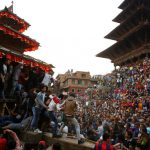 People throng the Nyatapola Temple in Bhaktapur to celebrate the 9 days long festival