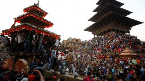 People throng the Nyatapola Temple in Bhaktapur to celebrate the 9 days long festival
