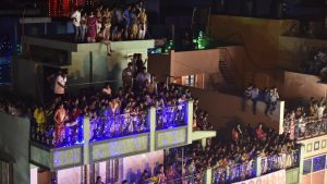 People watching the festival proceedings from neighbourhood roof tops on the occasion of Karaga