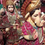 Ganesha figures show extensive variation with dissimilar patterns changing over ages. A different mixture of his elephant-like head, a pot belly and a small mouse makes him different from all other Hindu gods in appearance. Many a times, he is represented standing, sitting, dancing, like a warrior in heroic action against demons, playing with his family as a boy, sitting down, or in a significant range of contemporary situations when depicted in festival displays.