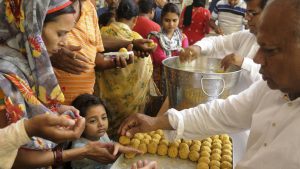 Scores of men, women and children thronged different temples to seek blessings on the day