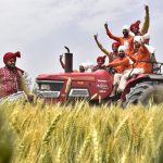 Students of Khalsa College performing traditional and Punjabi folk dance celebrating the coming harvest season in Amritsar