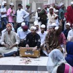 Sufi Qawali singers sing Qawalis in the compound of the shrine